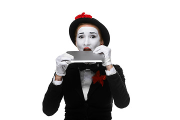 Image showing business woman in the image mime holding tablet PC