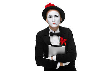 Image showing business woman in the image mime holding tablet PC