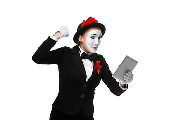 Image showing business woman in the image mime holding tablet PC