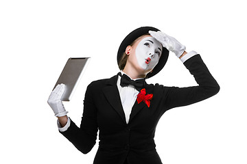 Image showing business woman in the image mime holding tablet PC