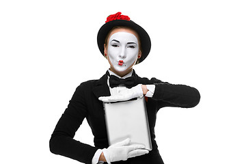 Image showing business woman in the image mime holding tablet PC