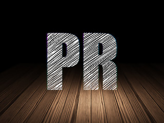 Image showing Advertising concept: PR in grunge dark room