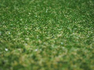 Image showing Green artificial synthetic grass meadow background