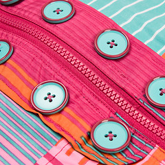 Image showing Close up zipper and button