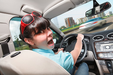 Image showing Driving lessons. The woman behind the wheel.