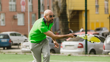 Image showing man play tennis outdoor