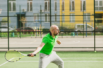 Image showing man play tennis outdoor