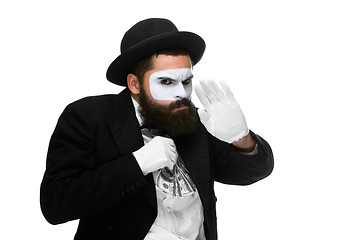 Image showing mime as businessman putting money in his pocket