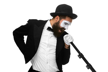 Image showing portrait of a man as mime with tube or retro style microphone