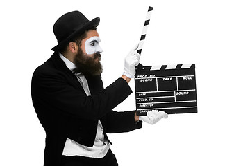 Image showing man in the image mime with movie board