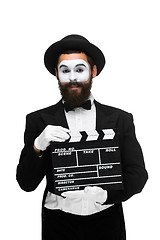 Image showing man in the image mime with movie board