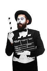 Image showing man in the image mime with movie board