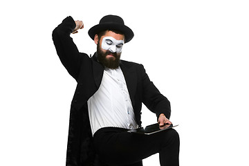 Image showing Mime as businessman has stress because of computer problem. 