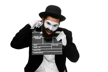 Image showing man in the image mime with movie board