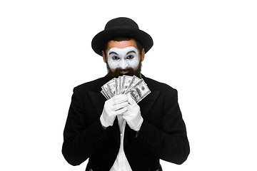 Image showing mime as a businessman holding dollar bills  