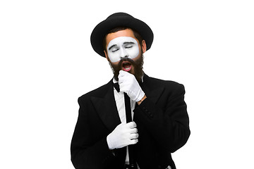 Image showing portrait of a man as mime with tube or retro style microphone