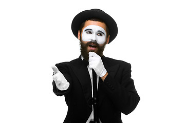 Image showing portrait of a man as mime with tube or retro style microphone