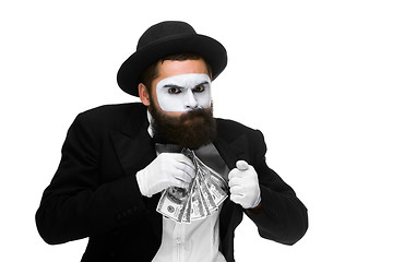 Image showing mime as businessman putting money in his pocket