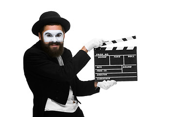 Image showing man in the image mime with movie board