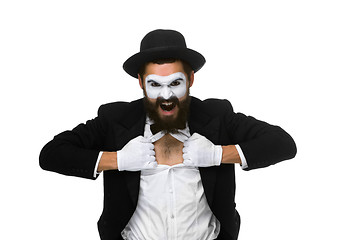 Image showing mime as a businessman tearing his shirt off 