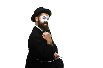 Image showing Mime as businessman has stress because of computer problem. 