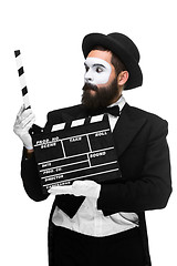 Image showing man in the image mime with movie board