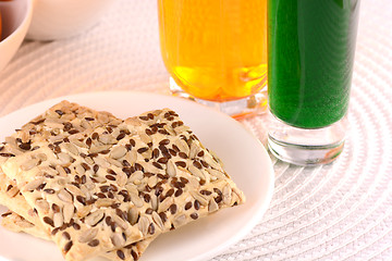 Image showing sweet cake on white plate with fresh juice