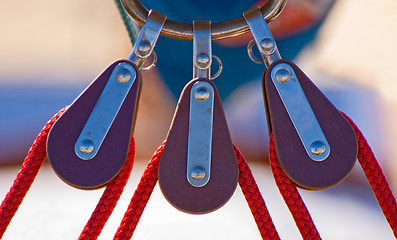 Image showing Three sailing pulleys