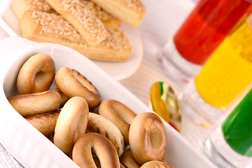 Image showing sweet cake on white plate and juice