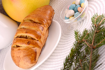 Image showing sweet cake on white plate and fruits