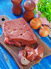 Image showing raw liver on board