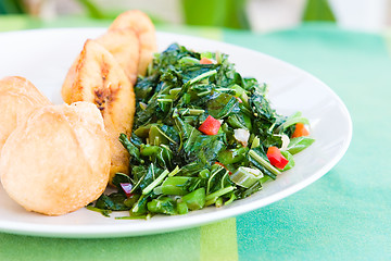 Image showing Callaloo Vegetable (Spinach) and Friend Dumplings - Caribbean St