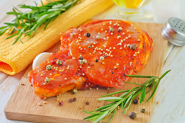 Image showing raw steak with aroma spices