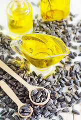 Image showing sunflower seeds and oil