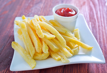 Image showing fried potato with sauce