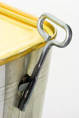 Image showing Locked can with key