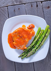 Image showing fried meat with sauce and asparagus