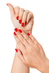 Image showing Woman with beautiful manicured red fingernails