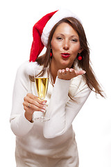 Image showing Playful woman celebrating Xmas blowing a kiss