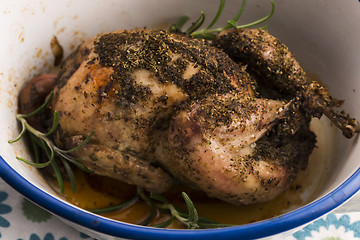 Image showing Roasted quail with herbs