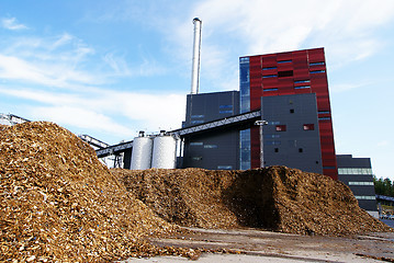 Image showing bio power plant with storage of wooden fuel (biomass) against bl