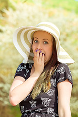 Image showing Grimace portrait of cheerful fashionable woman with hat