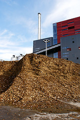 Image showing bio power plant with storage of wooden fuel (biomass) against bl