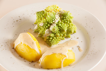 Image showing Romanesco with boiled potatoes and cheese sauce