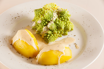 Image showing Romanesco with boiled potatoes and cheese sauce