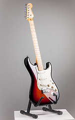 Image showing Electric guitar isolated on gray background