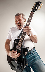 Image showing portrait of a guitar player 