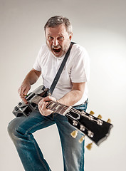 Image showing portrait of a guitar player 