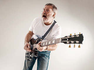 Image showing portrait of a guitar player 