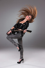 Image showing Beautiful girl playing guitar